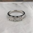 Round Cut Three Stone Ring