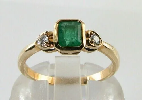 Emerald Three Stone Ring