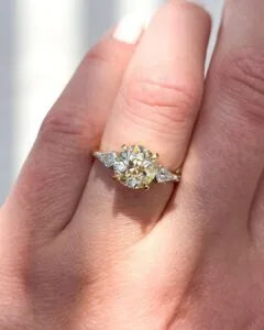 Round three stone ring