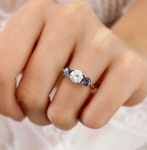 White Round Cut Three Stone Ring