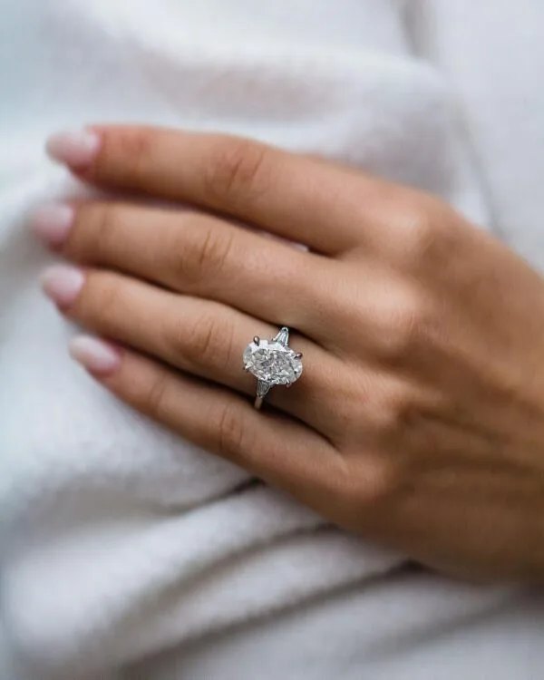 Oval solitaire proposal ring