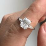 Radiant three-stone ring