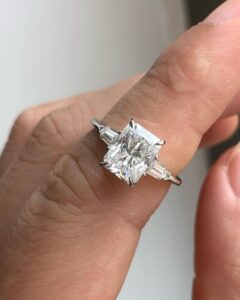 Radiant three-stone ring