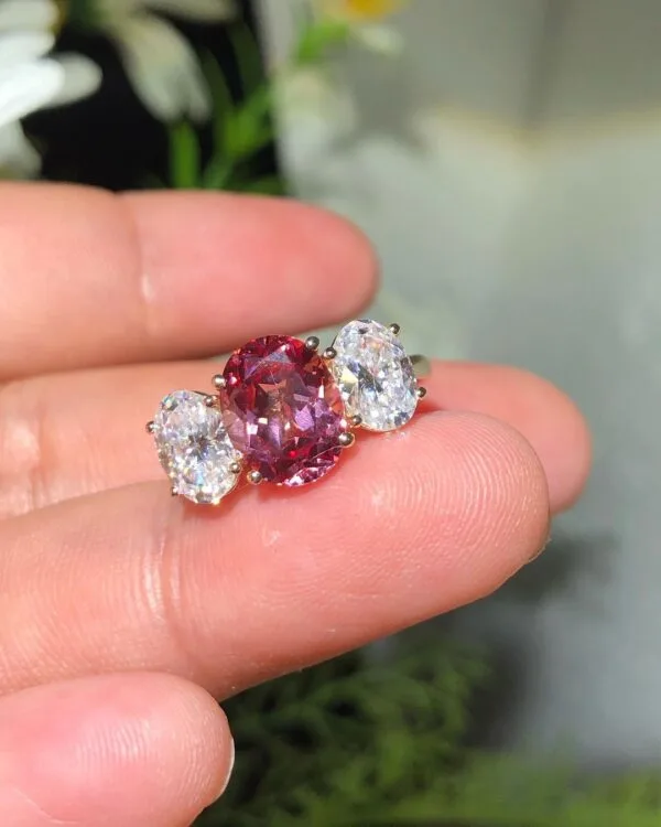Oval cut three-stone ring