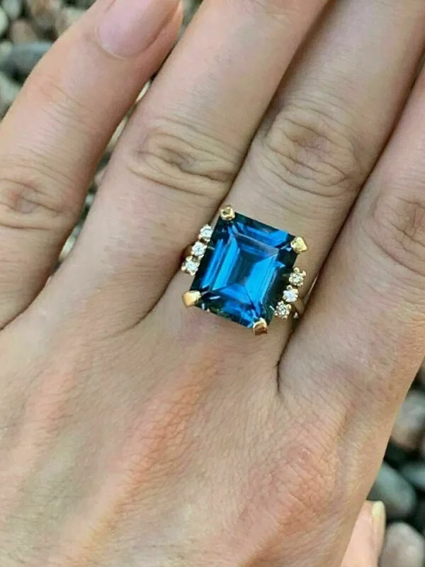 Topaz Emerald Solitaire Ring