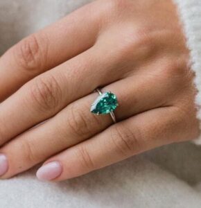 Pear Solitaire Anniversary Ring