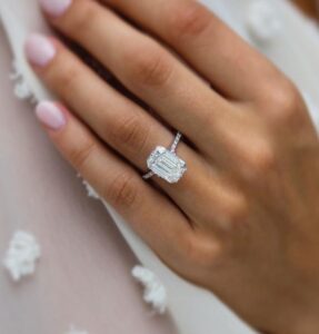 White Emerald Cut Solitaire Ring
