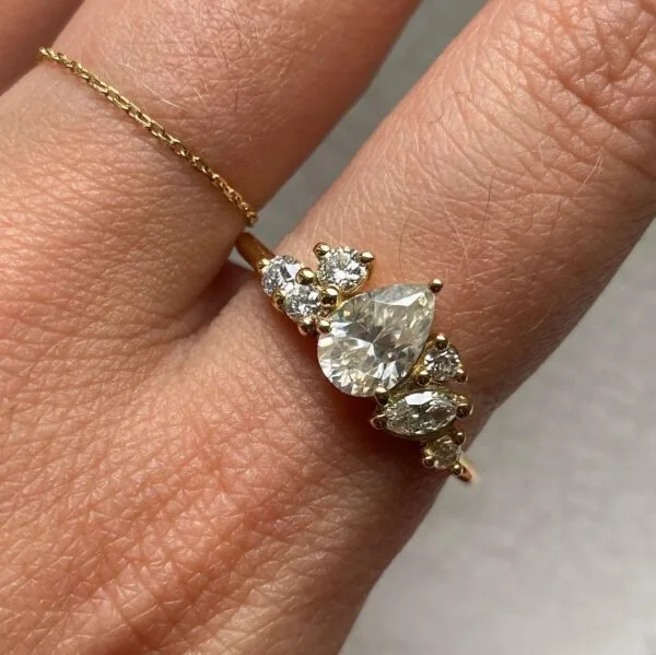 Pear Solitaire Anniversary Ring